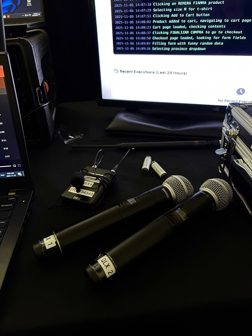 Stage microphones and the live AI demo screen at Meet Magento Canada 2025